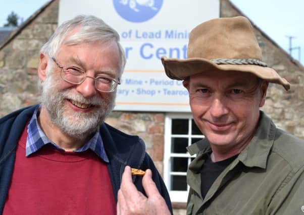 We've struck gold! Museum Trustee Gerard Godfrey and gold  panning expert Leon Kirk with the 18.1 golden nugget found at Wanlockhead. (Pic by Sara Bain)