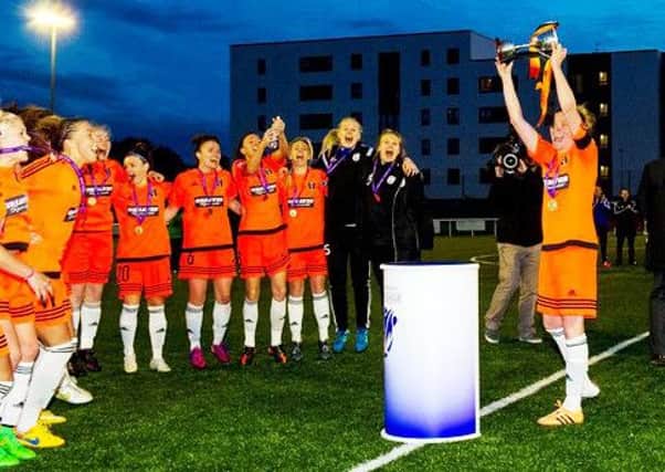03/06/15 SWPL CUP FINAL 2015
GLASGOW CITY V HIBERNIAN
AINSLIE PARK - EDINBURGH
Glasgow City captain Leanne Ross celebrates with the SWPL cup.