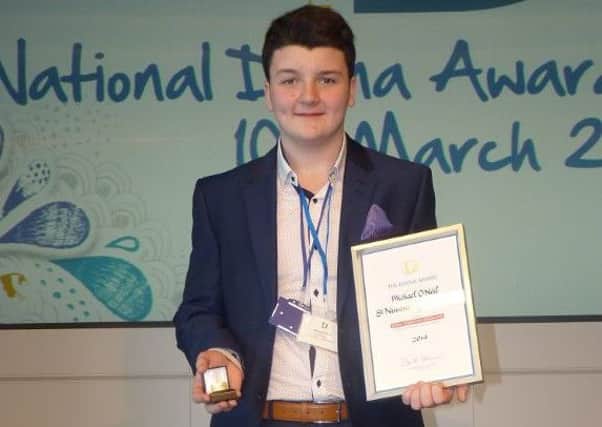 Above: St Ninian's pupil Michael collects his award in London. Below: Williamwood's James Ferguson with his award.