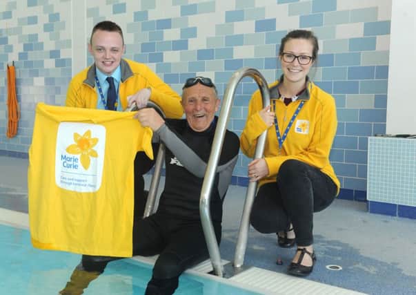 Mark O'Neill and Susan Cuthbert from Marie Curie with Sandy.