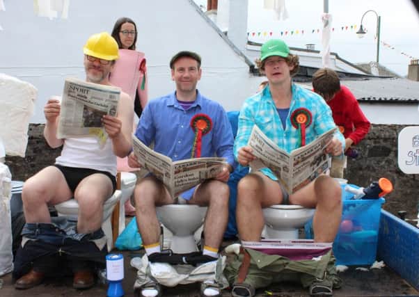 Avid Gazette readers...
Robin McAlpine, Grant Sutherland and Ewan McAlpine on Bog Standard float in Biggar Gala Day (Pic David Carvel)