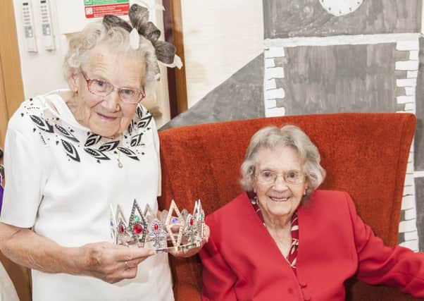 Regal dreams...Crowning lady Grace Dickson, complete with posh hat, is ready to crown McClymont's queen Nan Oswald aged 101. (Pic Sarah Peters)