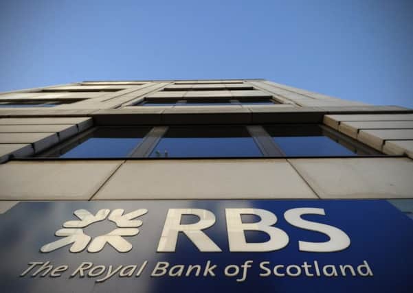 (FILES) This file picture taken on January 27, 2012 shows a Royal Bank of Scotland (RBS) sign outside a branch of the bank in central London. Royal Bank of Scotland on June 17, 2015 was hit by a technical glitch as 600,000 payments due to customers of Royal Bank of Scotland failed to turn up in accounts. AFP PHOTO / CARL COURTCARL COURT/AFP/Getty Images