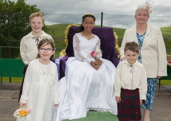 Regal photo call...Crawford Gala Day 2015 Queen Shannon Soanes was crowned by Kathleen Fleming, as flower girl Carmo Monteiro, champion Archie Damer and page boy Jack Taylor looked on. (Pic Sarah Peters)