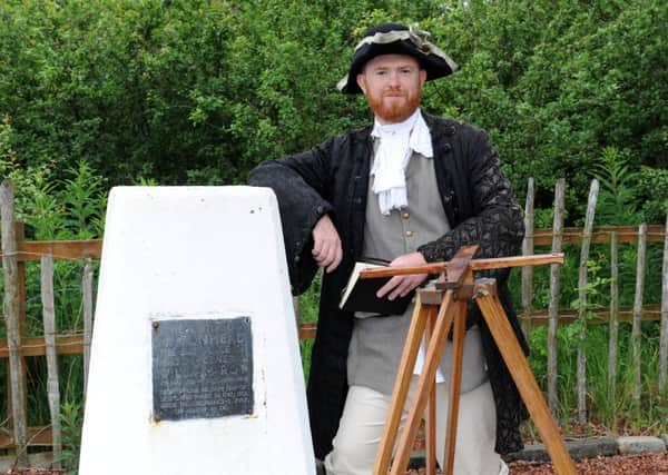 Fleeting visit...General Roy (alias Northlight's Paul Murtagh) back at the Carluke monument to his life to launch Mapping the Past   (Picture by Alan Watson)