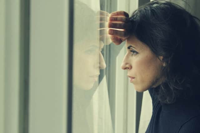 A Generic Photo of a pensive woman looking out of window. See PA Feature ADVICE Advice Column. Picture credit should read: PA Photo/thinkstockphotos. WARNING: This picture must only be used to accompany PA Feature ADVICE Advice Column.