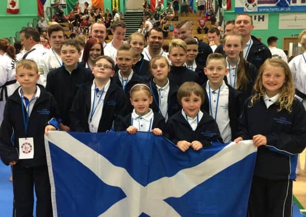 XS Tae-kwon do members from Cumbernauld celebrate their world championship success
