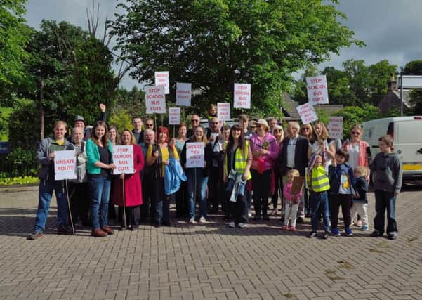 School bus cuts protest leaving Kirkfieldbank