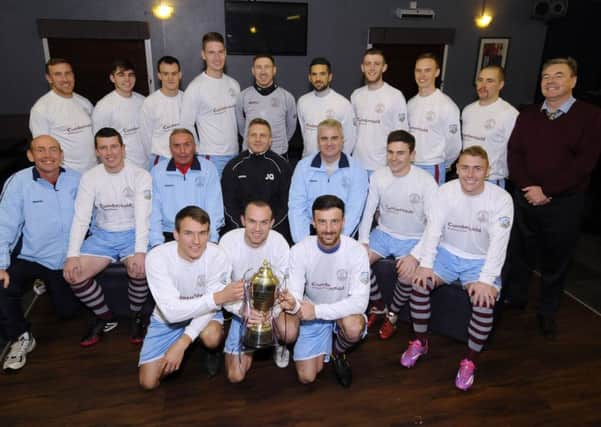 Cumbernauld's players after winning last year's trophy
