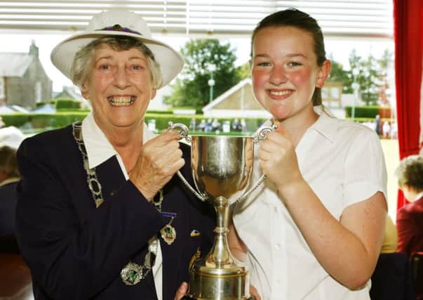 Lanark Thistle Bowling Club member Chantelle Geddes (17) receives the Lanarkshire Girls Singles title won at Lanark Bowling Club, August 2015 (Pic by Jim Clare)