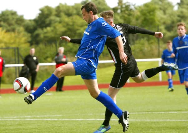 Gordon Murphy scores the winner for Carluke Rovers against Wishaw in a 1-0 Sectional League Cup tie win at John Cumming Stadium on August 14, 2015 (Pic by Jim Clare)