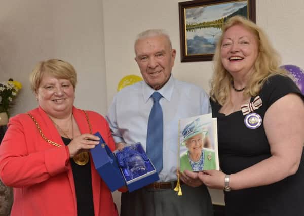 Birthday boy...Davie Thonson celebrated his 100th birthday last week with Provost Eileen Logan and Depute Lieutenant Margaret Morton
 (Pic from South Lanarkshire Council)