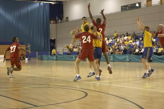 Alan Govan of Tryst '77 (in yellow) in action in the Liverpool International Handball Tournament