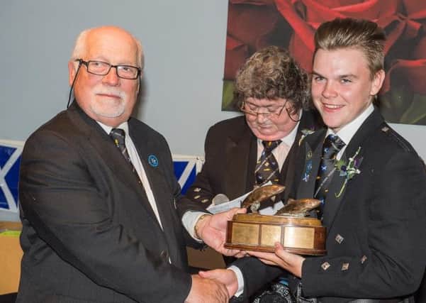 Cumbernauld angler Blaine O'Donnell (right), winner of the Welsh Water Authority Trophy( Brown Bowl) Heaviest overall Basket and the Stirling Council Trophy (Top Scottish Rod),
