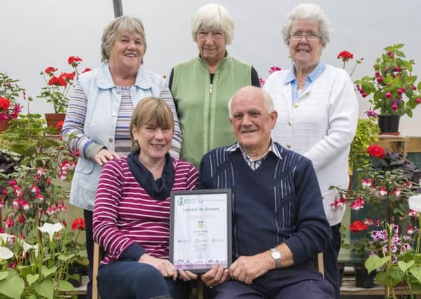 Delighted...Members of Lanark in Bloom who won a Silver Gilt award this year. (Picture Sarah Peters)