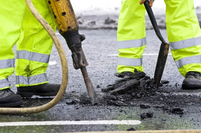Ian Georgeson
07921 567360
Transport Leader Cllr Gordon MacKenzie oversees the start of the Pot hole Repairs on Melville drive, Edinburgh, Carriered out by road contractors Lightways. Road works, Digging, traffic, tarmac,