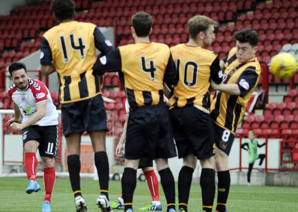 Clyde's Sean Higgins tries his luck from a free-kick against Berwick Rangers.
