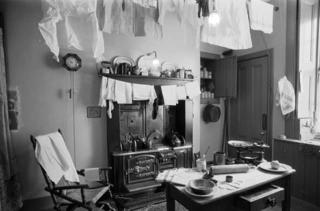 Kitchen with washing hanging from the pulley will invoke memories