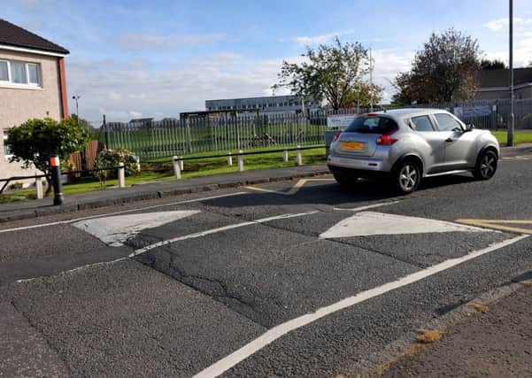 09-10-2014 Picture Roberto Cavieres.  speed bumps on Burns Road, Kirkintilloch (just past Harestanes Primary School).