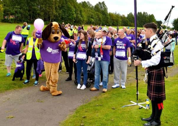 Alzheimer Scotlands mascot leads the way at Strathclyde Park.