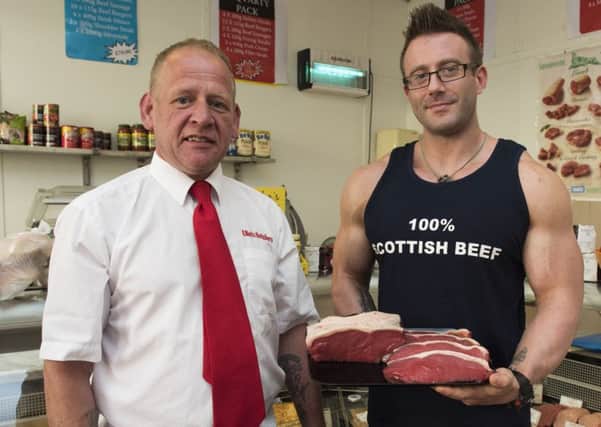 Lanark butcher Alan Elliot with bodybuilder Alistair Wilson (Picture Sarah Peters)