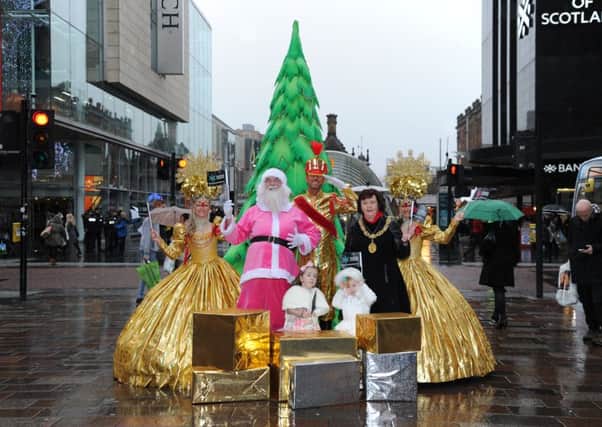 Glasgows Lord Provost Sadie Docherty with  Grace and Tilly help to launch the citys Style Mile Carnival in Argyle Street. Pic: Glasgow City Council
