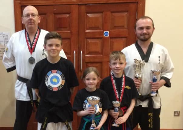 Members of the XS Tae Kwon Do club in Cumbernauld who enjoyed success at the recent English Nationals