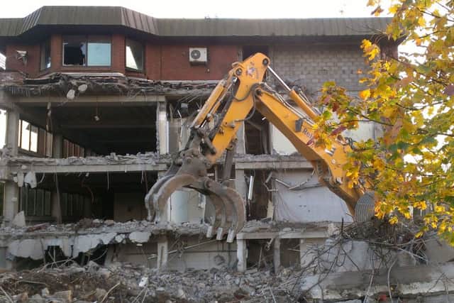 The former Tom Johnston House council headquarters are being knocked down