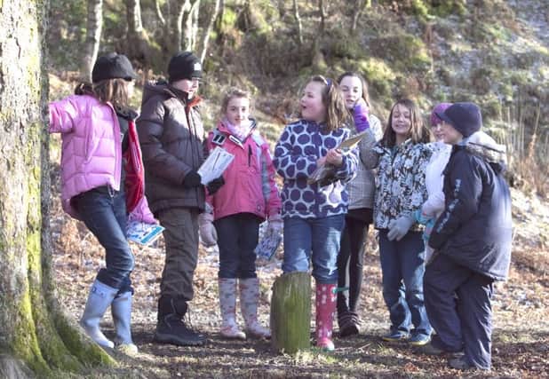 Children from the Junior Nature Club at Mugdock Country Park enjoy a day out on the countryside trail.