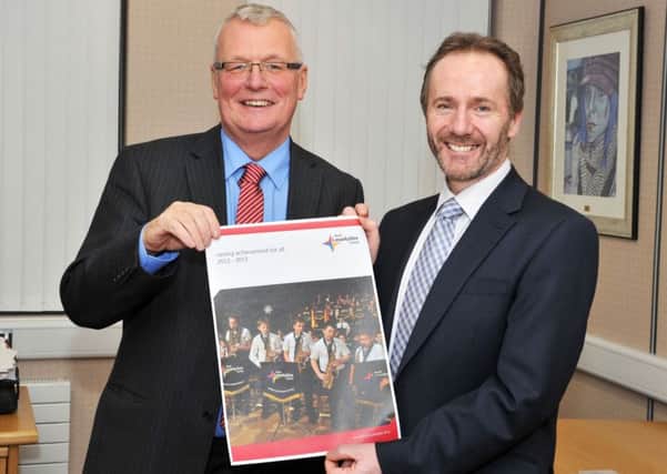 Andrew Sutherland, right, with Councillor Jim Logue, convener of learning and leisure services.