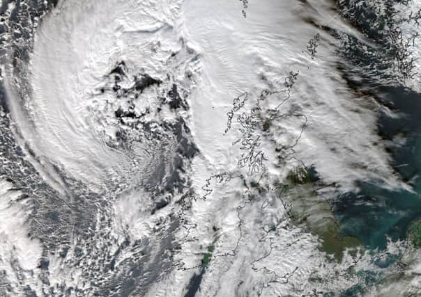 Handout satellite image issued by the University of Dundee, taken at 12:45pm today, showing Storm Abigaill which is set to sweep across Britain, threatening gusts of up to 90mph in exposed areas. PRESS ASSOCIATION Photo. Issue date: Thursday November 12, 2015. The storm is the first such weather system affecting the country to merit a name as part of the Met Office ''name our storms'' project, which asked the public to suggest names. See PA story WEATHER Abigail. Photo credit should read: University of Dundee/NEODAAS/PA Wire

NOTE TO EDITORS: This handout photo may only be used in for editorial reporting purposes for the contemporaneous illustration of events, things or the people in the image or facts mentioned in the caption. Reuse of the picture may require further permission from the copyright holder.