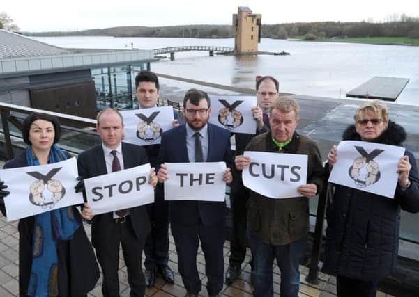Labour councillors from across Lanarkshire (l-r) Monica Lennon, Frank McNally, Ged Killen, Paul Kelly, Richard Tullett, Andrew Spowart and Maureen Devlin make their feelings known on the council cuts.