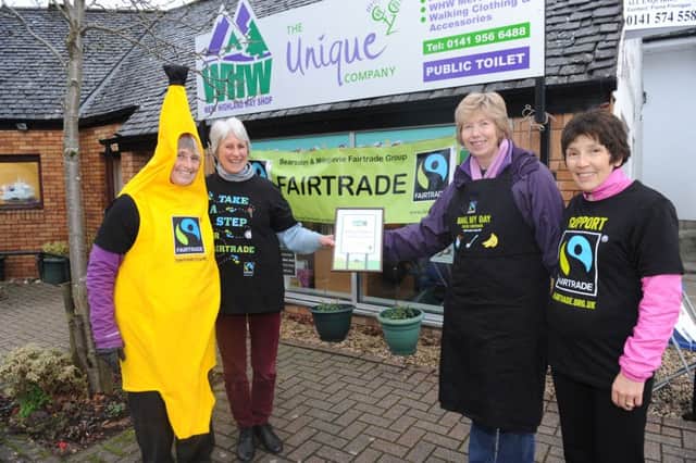 Milngavie precinct. Fairtrade group celebrating Fairtrade status for Milngavie and Bearsden. L/R Sue Milne, Myra Mcfarlane, Margaret Morrison - Chairperson, Ruth Gettinby.