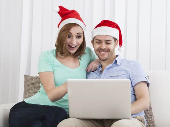 A couple organising Christmas together.