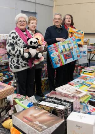 New Beginnings Christmas Toy Appeal, co-ordinator Mary McLellan and volunteers with some of the toys that have been donated at the Lanark collection centre on Wednesday, December 10, 2014.

Pics by freelance photographer Sarah Peters