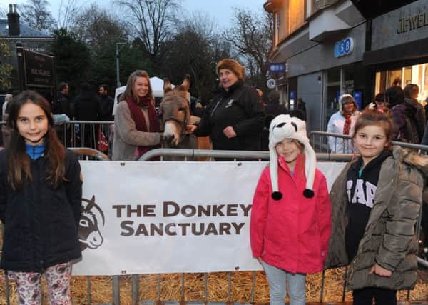 Milngavie Christmas lights switch on. The Donkey  Sanctuary. Jacqui Methven - volunteer, Elma Cunningham - welfare officer. Kids L/R Emily Reynolds (9) Kara Reynolds (7) Lily Gibson (7).
