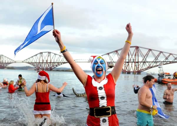 In some parts of Scotland people take part in Loony Dooks to bring in the New Year. Pic Neil Hanna