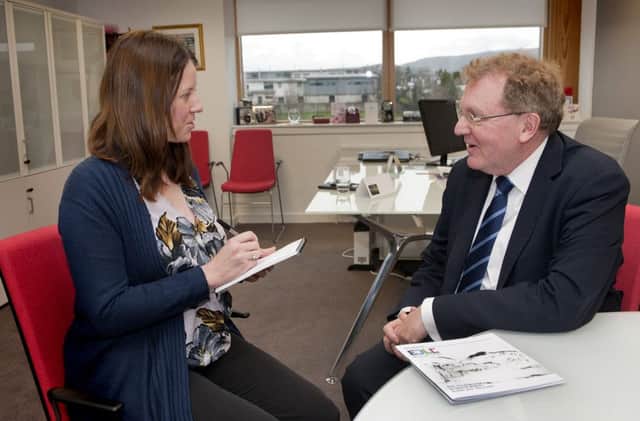 David Mundell, Scottish Secretary, with reporter Laura Sturrock