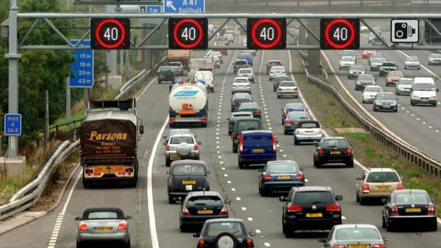 Motorists driving on the hard shoulder of one of the busiest stretches of motorway in Britain between junctions 3 and 7 of the M42.