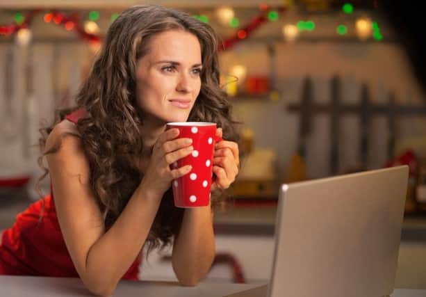 A woman Christmas shopping on her laptop at home. See PA Feature FINANCE Christmas Fraud. Picture credit should read: PA Photo/thinkstockphotos. WARNING: This picture must only be used to accompany PA Feature FINANCE Christmas Fraud.