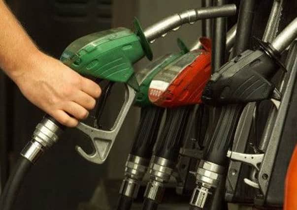 Petrol prices have fallen below £1 a litre for the first time in years.