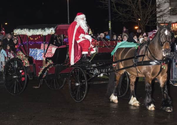 Santa arrives at Carluke on Christmas Eve (Picture by Sarah Peters)
