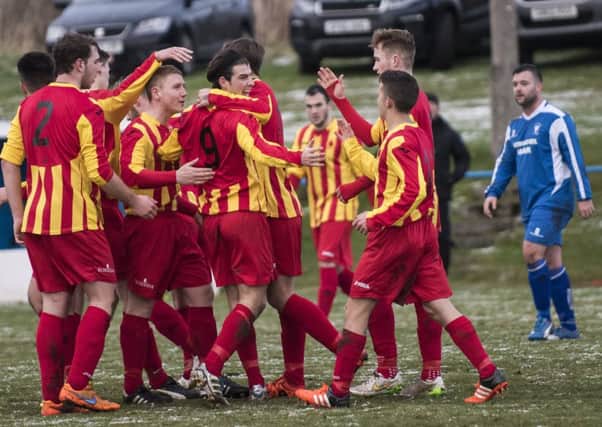 Rossvale celebrate a goal during their third round win at Lanark.