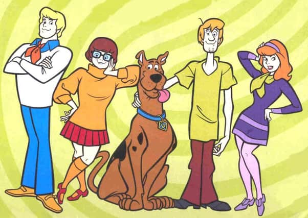 Scooby Doo (centre) with his mystery-solving chums