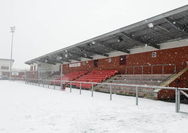 The scene at Petershill as snow forces Rossvale's cup tie to be called off