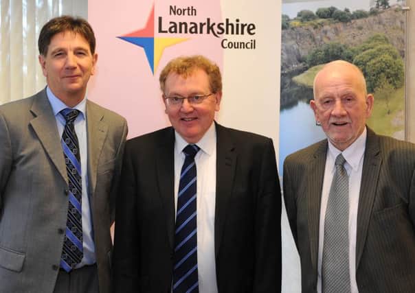 Jim McCabe, right, with council chief executive Paul Jukes, left, and Scottish Secretary David Mundell last month.