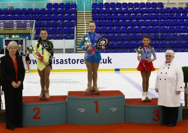 Christie Anne on the podium after winning the British title
