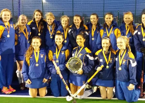 The High School of Glasgow Girls Hockey Team celebrate winning the BP Schools Hockey Plate.