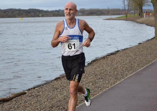 Garscube's Rob McLellan in action during the Masters relays at Strathclyde Park. Pic by Stephen Duffy.