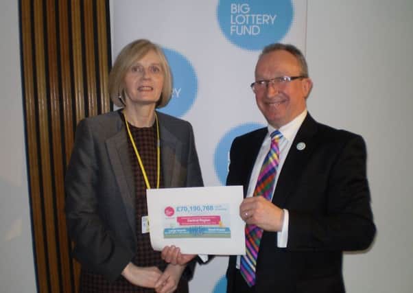 MSP John Wilson with Big Lottery Fund Scotland chairperson Maureen McGinn.